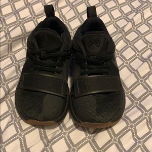 Black nike toddler sneaker.
